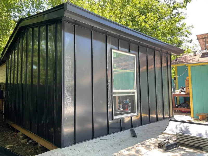 Black standing seam metal wall panels for Metal Roof Installation in Ambler